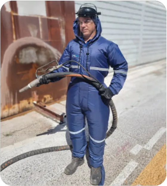 Chorreado húmedo con mono impermeable y Air Comfort